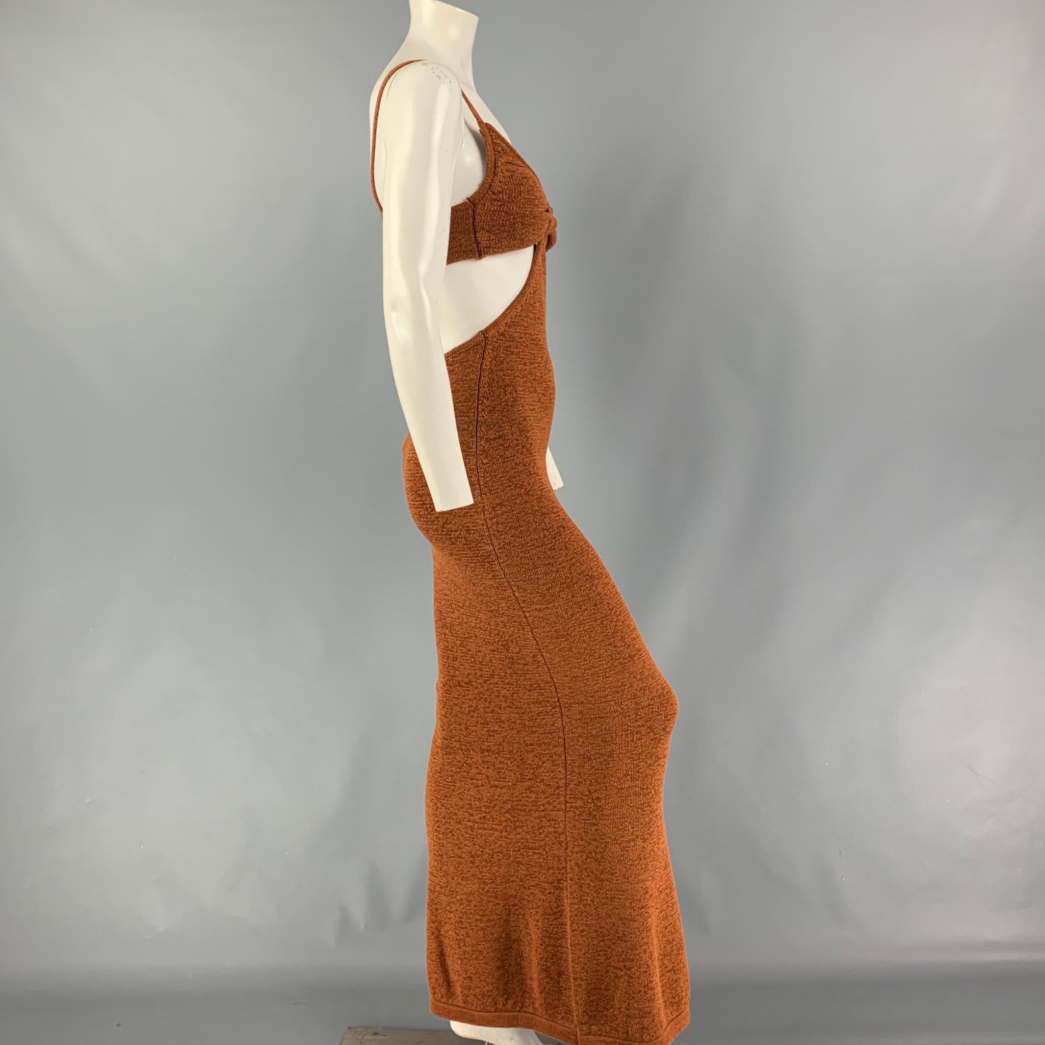 CULT GAIA 'Serita' dress comes in a rust knitted cotton / polyester featuring side cut-out details and spaghetti straps. 

New With Tags.
Marked: S
Original Retail Price: $458.00

Measurements:

Bust: 21 in.
Waist: 22 in.
Hip: 29 in.
Length: 56 in. 