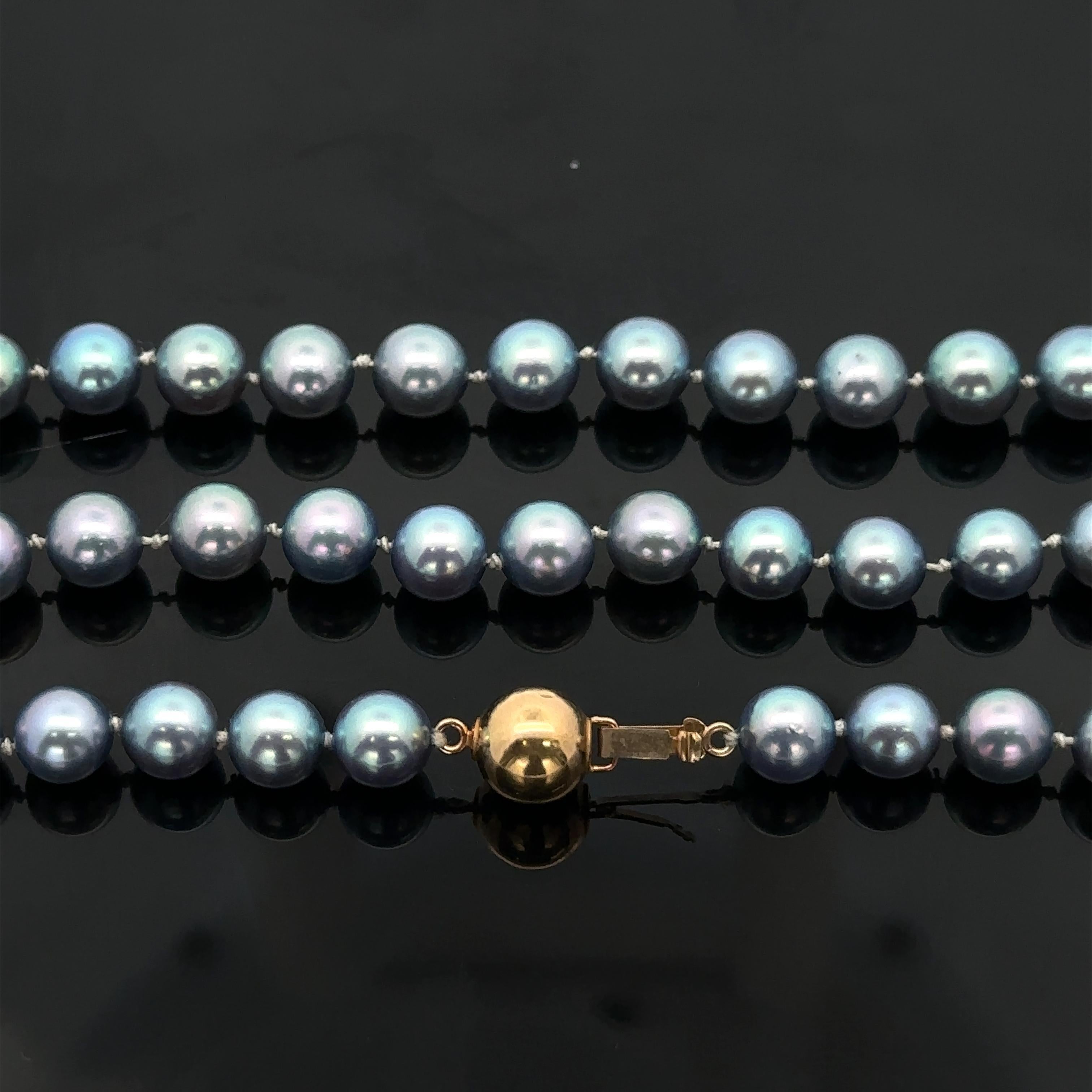 --Pierre(s) :...
(Nombreuses) Perles de culture véritables - forme ronde - enfilées - couleur grise avec reflets roses - 6,5mm à 7mm (approx.)

Matière : Fermoir en or jaune 14k
Poids : 53,24 grammes 
Longueur : 37.5
