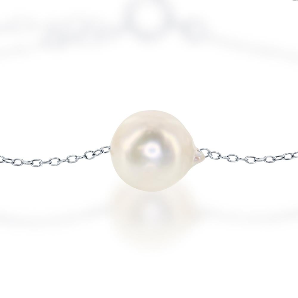 This sterling silver bracelet features a single cultured Akoya baroque 8-8.5mm pearl. The bracelet has a finished length of either 7 or 8 inches. 