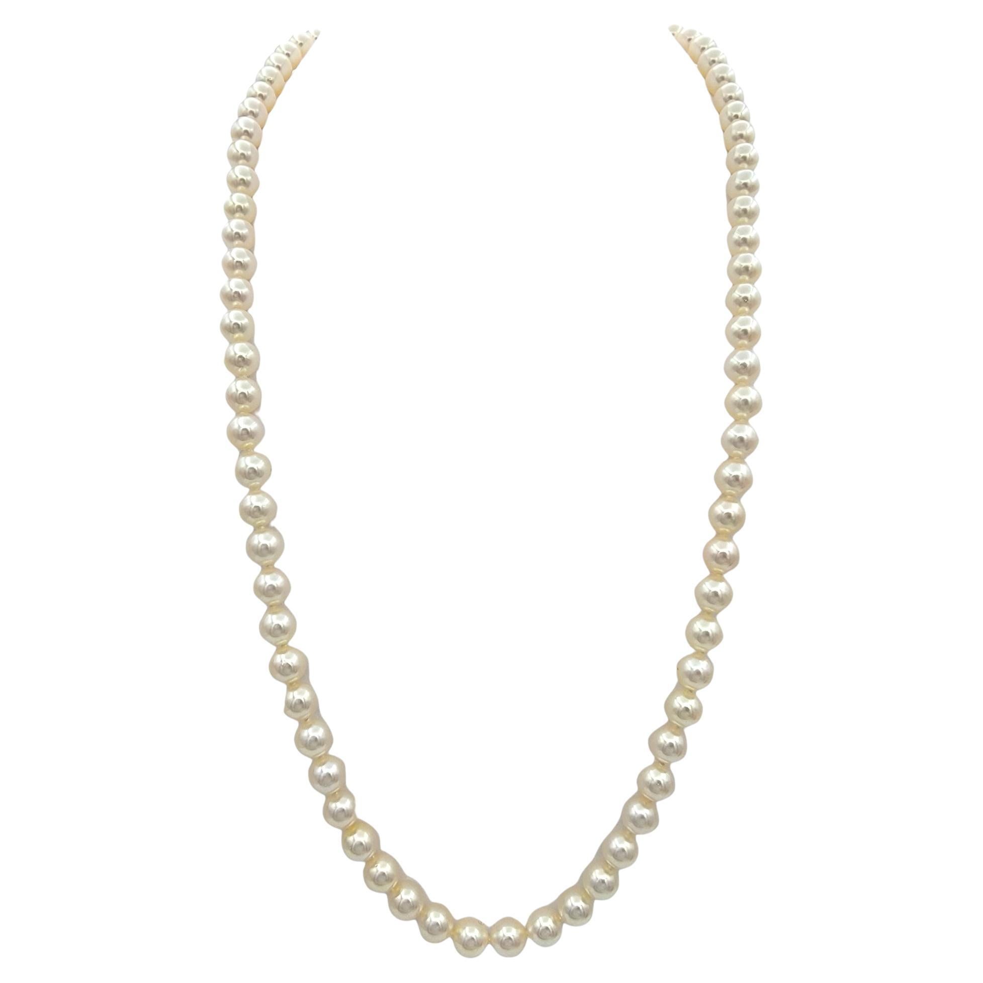 Cultured Akoya Pearl 24" Necklace with 14 Karat Yellow Gold Diamond Bow Clasp