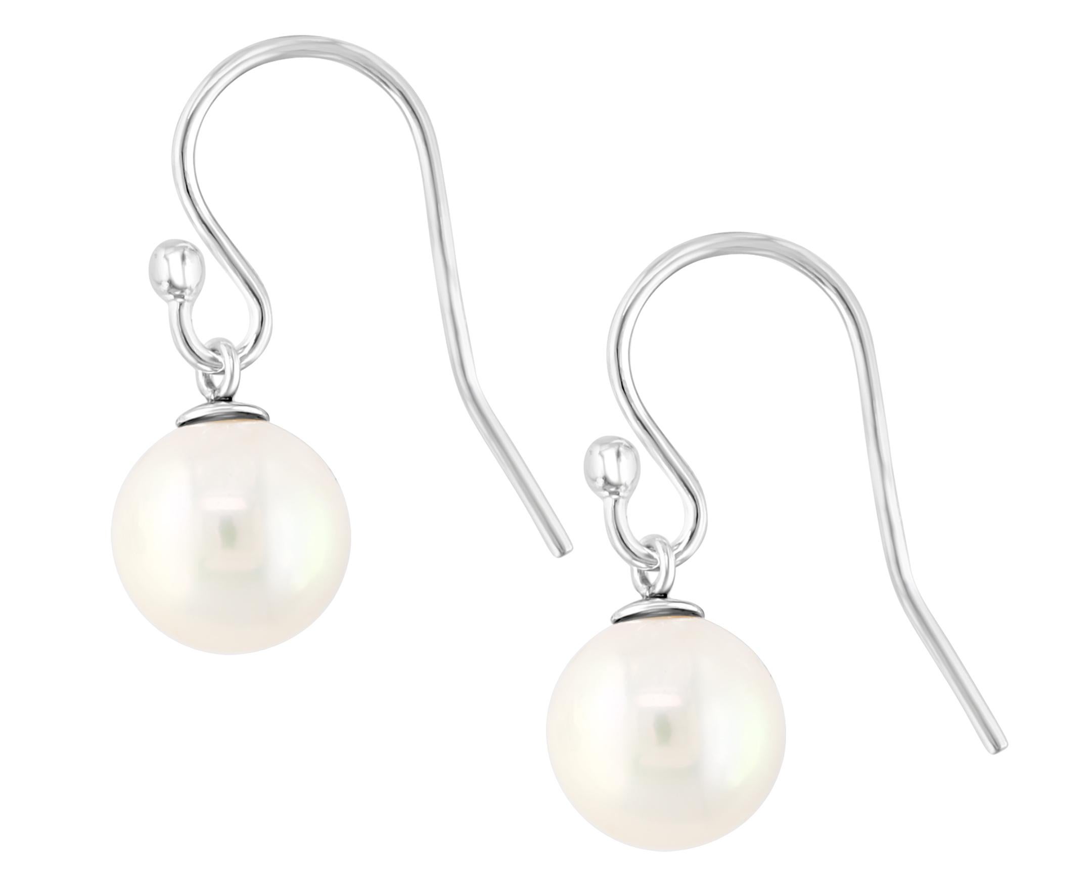 These beautiful earrings feature cultured freshwater, white round pearls measuring 7.5-8mm. The pearls dangle beneath sterling silver ear wires.  Simple, yet elegant, this style is an essential for any collection.
AN ELEGANT EXPRESSION – This
