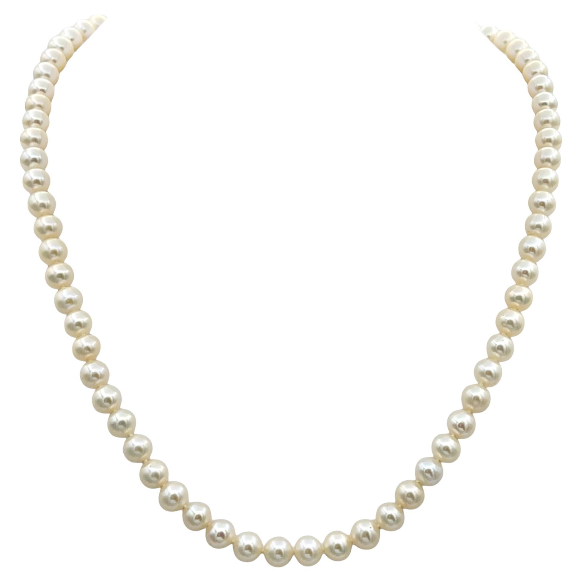 Cultured Freshwater Pearl 18" Strand Necklace with Bow Clasp in 14 Karat Gold