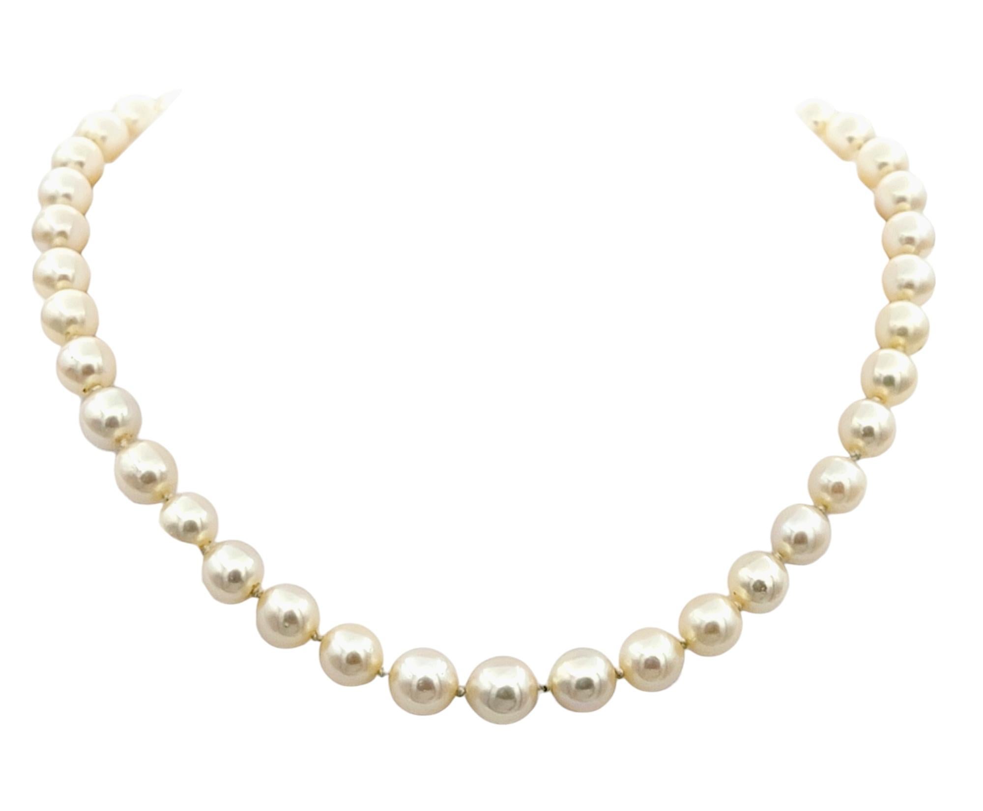 Embrace timeless elegance with this exquisite cultured freshwater pearl choker necklace, a piece that exudes vintage charm and sophistication. Each luminous pearl is carefully selected, creating a graceful strand that sits beautifully along the