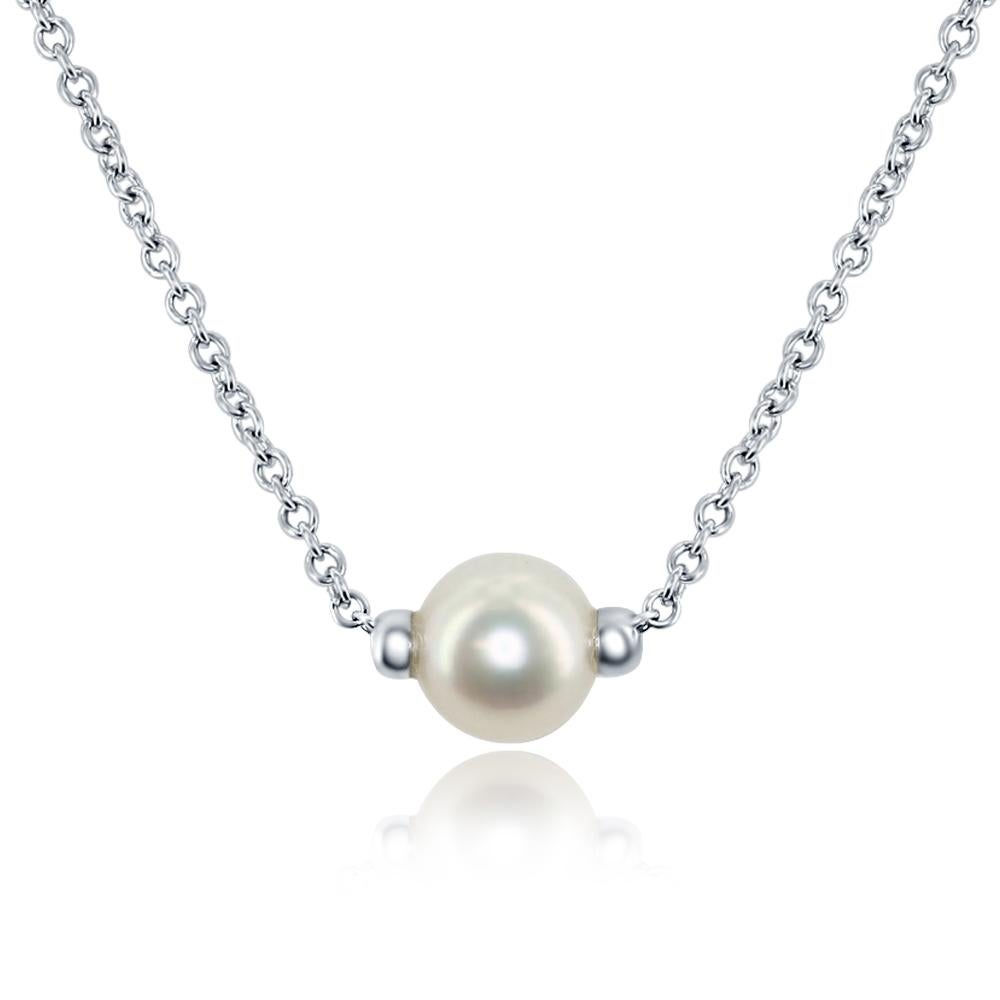 This 6.5-7mm freshwater cultured white round pearl is set on an 18