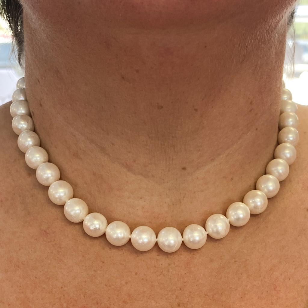 Add a fresh touch to your favorite pearl look with this strand! Wear this strand in the classic style showing only pearls, or spin the strand to display the clasp somewhere at the front as a bright accent along your line of pearls! These beautiful