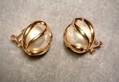 Boucles d'oreilles en perles de culture de Mabe, or et diamants