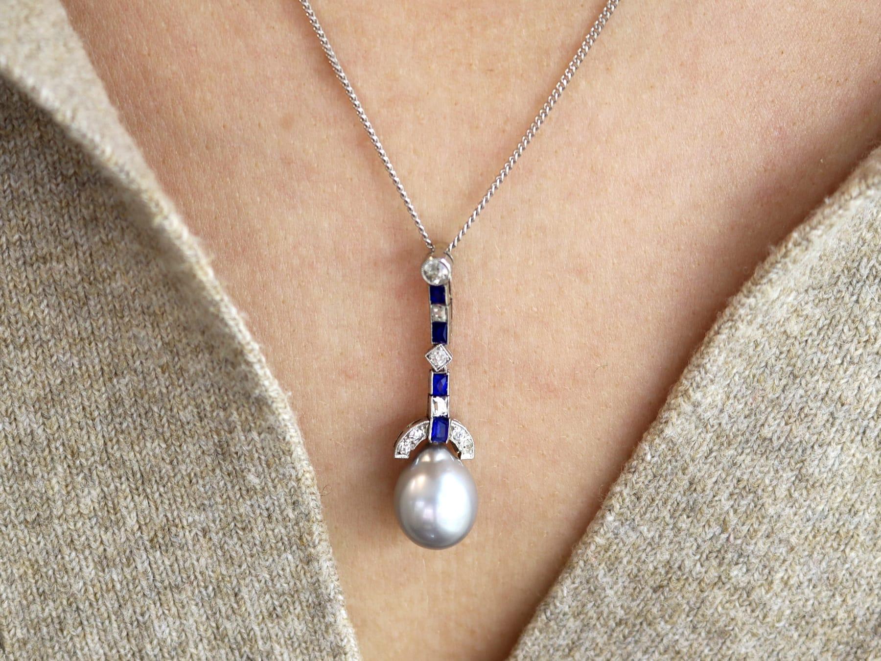 Baguette Cut Cultured Pearl, 0.30 Carat Sapphire and 0.35 Carat Diamond, Platinum Pendant