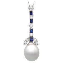 Cultured Pearl, 0.30 Carat Sapphire and 0.35 Carat Diamond, Platinum Pendant