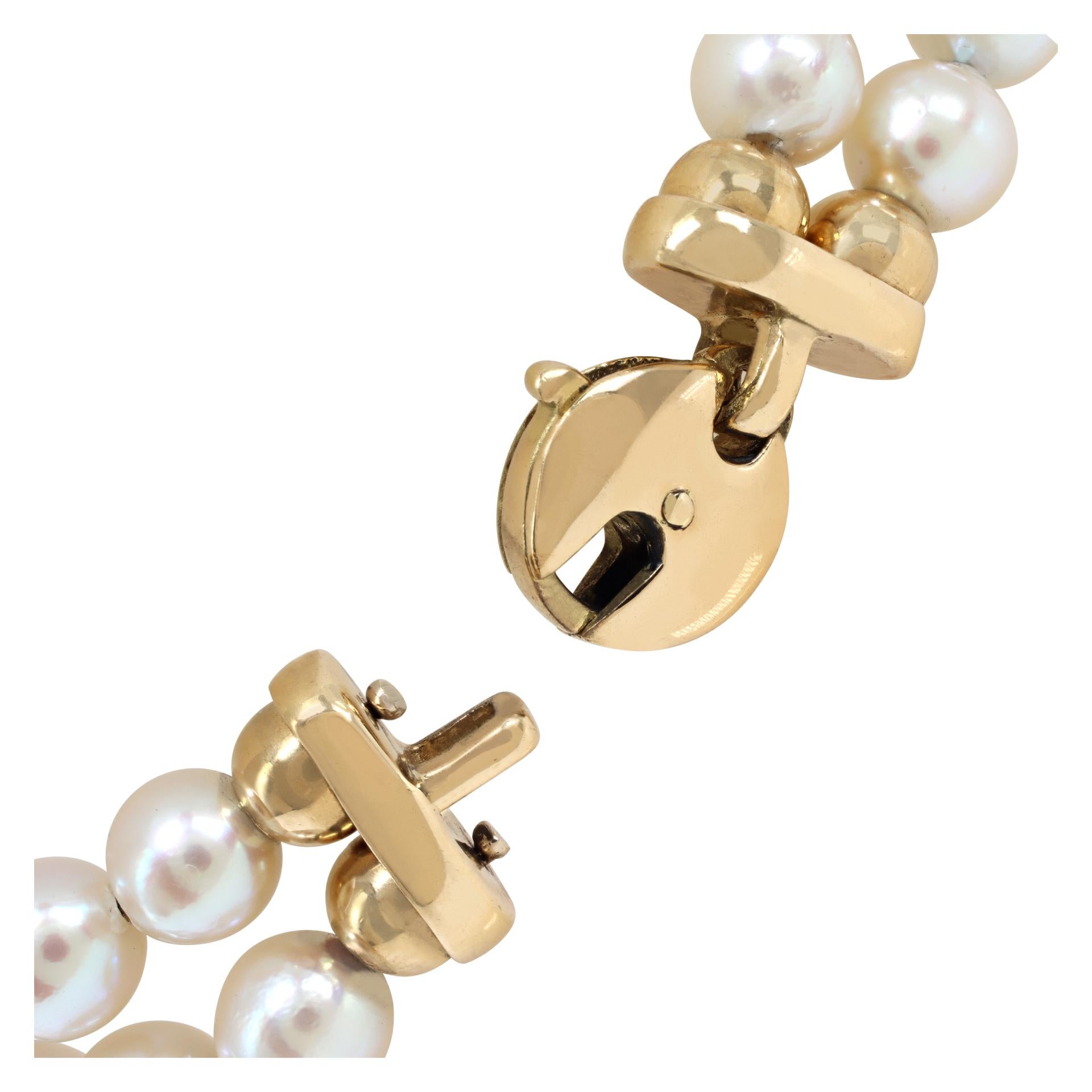 Women's Cultured Pearl (6.5 x 7mm) bracelet with cabochon ruby and sapphire in 18K gold For Sale