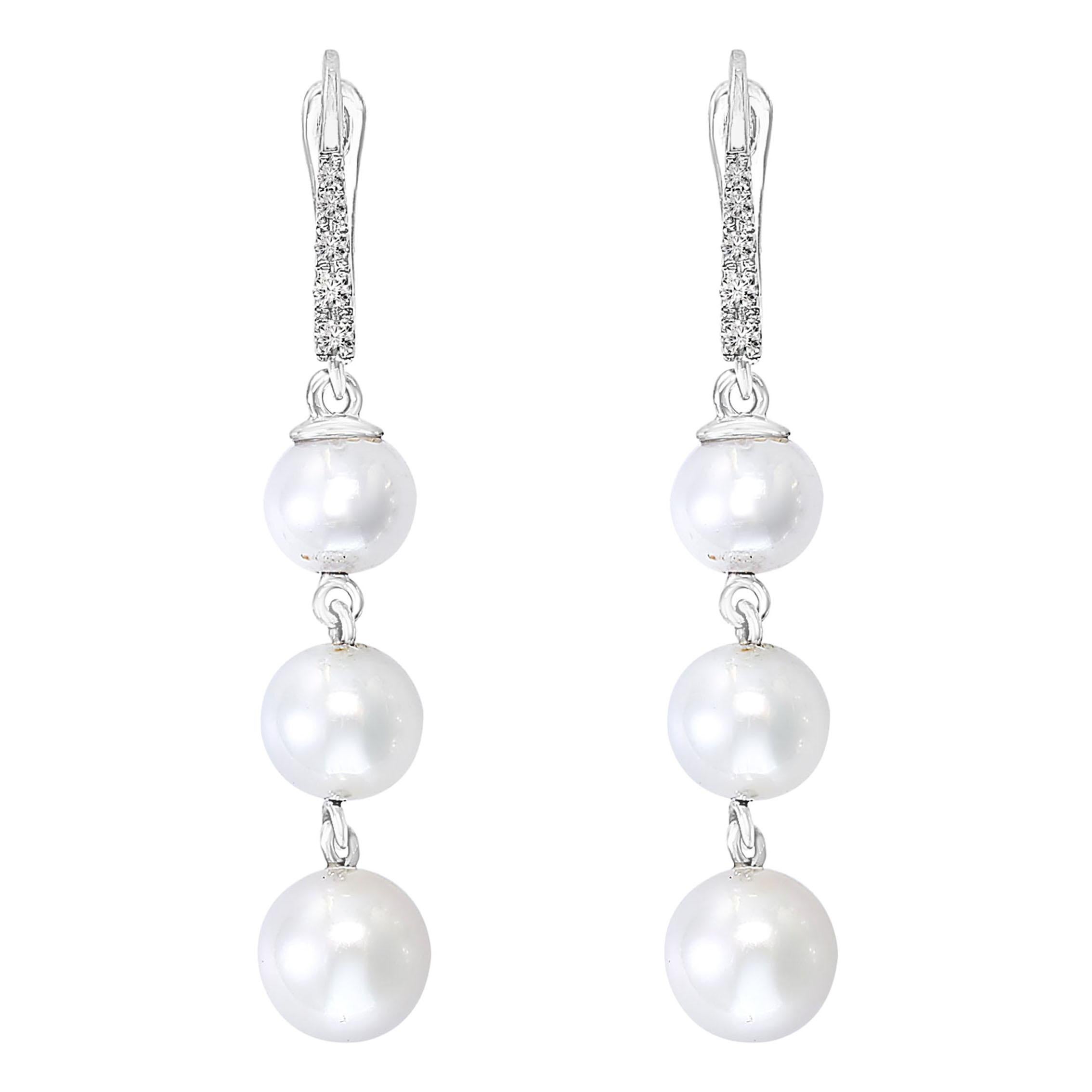 Cultured Pearl and Diamond Dangle Earrings in 14 Karat White Gold