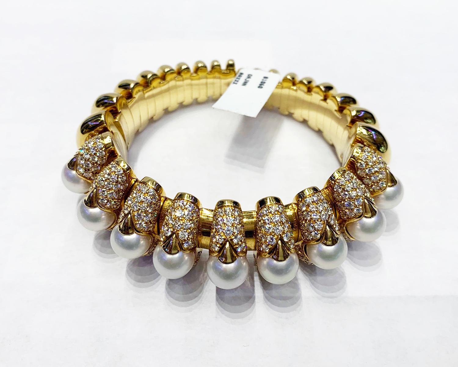 Cultured Pearl and Diamond Gold 'Celtaura' Cuff-Bracelet by Bulgari

The sprung cuff composed of fluted links set with a row of nine cultured pearls measuring approximately 8.5 to 8.4 mm, accented by pavé-set round diamonds. Made and signed Bulgari,