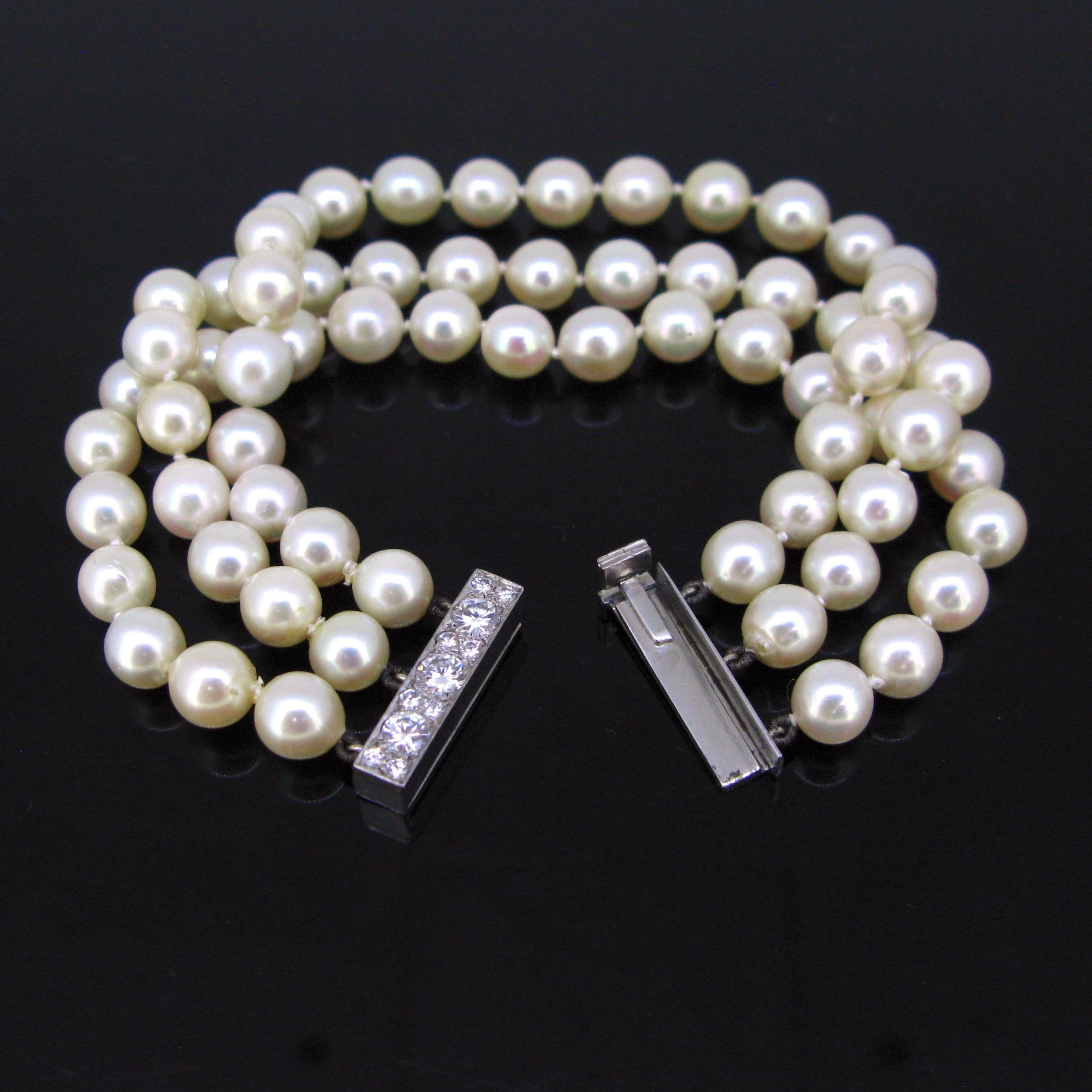 This bracelet features 3 rows of cultured pearls. They have nice ivory, beige and pink undertones. The clasp is made in 18kt white gold and adorned with brilliant cut diamonds. There is an approximate total carat weight of 1.20ct. It is an elegant