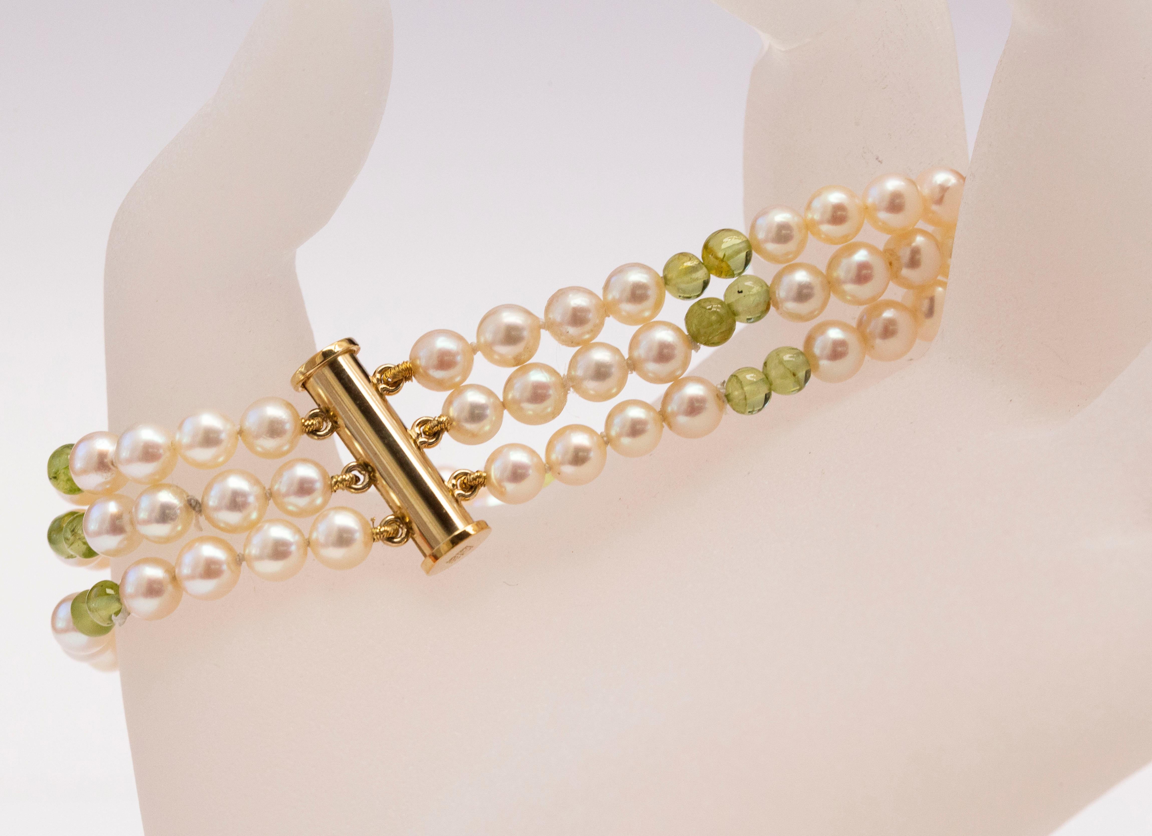 Women's Cultured Pearl and Peridot Triple Strand Bracelet with 14 Karat Gold Closure For Sale