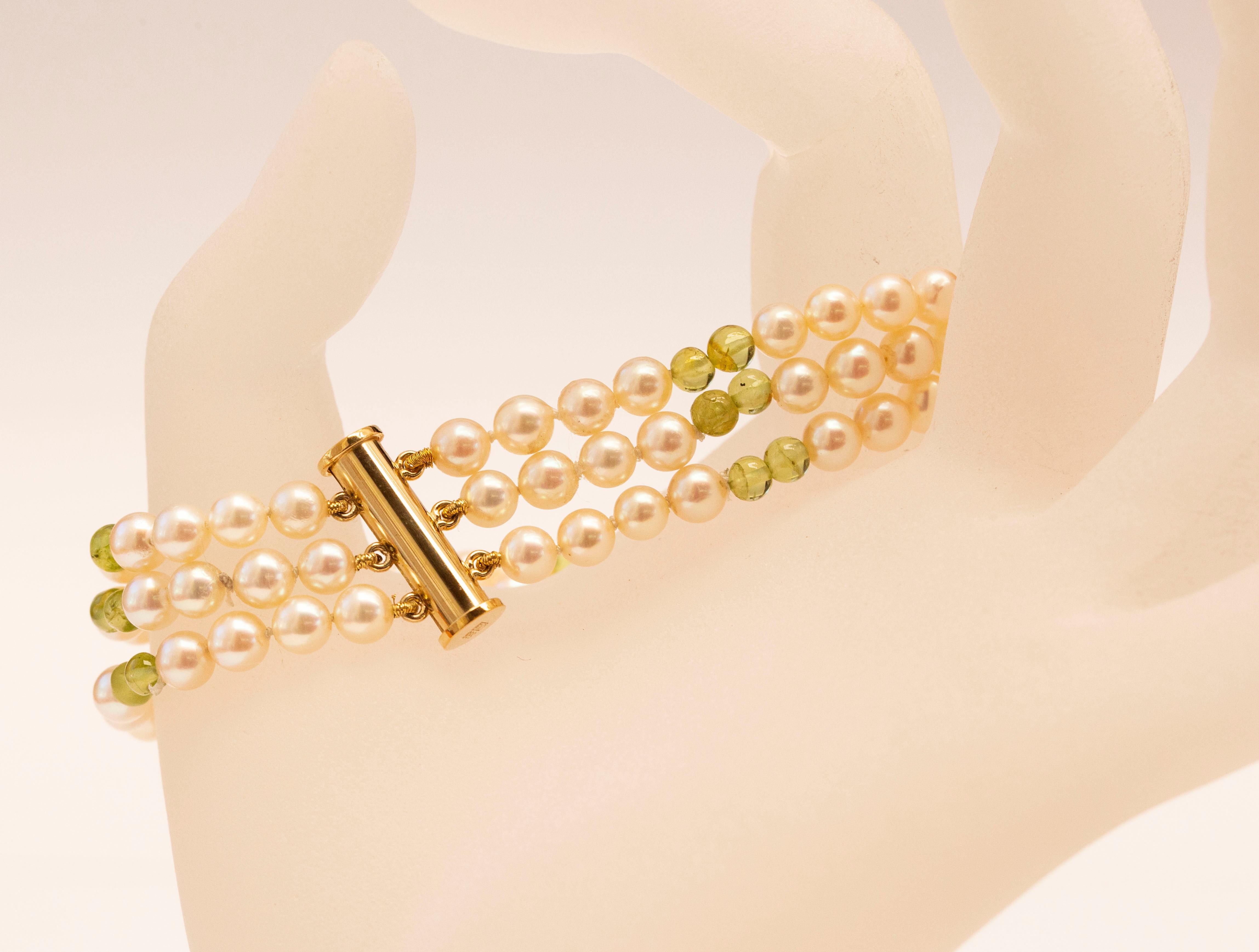 Cultured Pearl and Peridot Triple Strand Bracelet with 14 Karat Gold Closure For Sale 1
