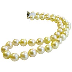 Cultured Pearl Antique Necklace with 14 Karat White Gold and Sapphire Brooch