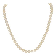 Collier de perles de culture et diamants, brin noué en or 18 carats