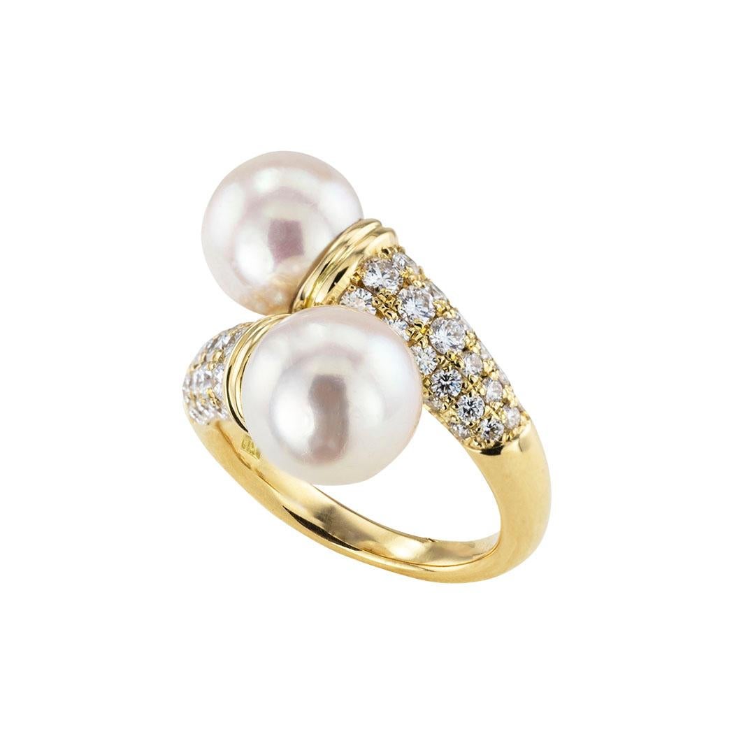 Cultured pearl diamond and yellow gold bypass ring circa 1990.  Clear and concise information you want to know is listed below.  Contact us right away if you have additional questions.  We are here to connect you with beautiful and affordable
