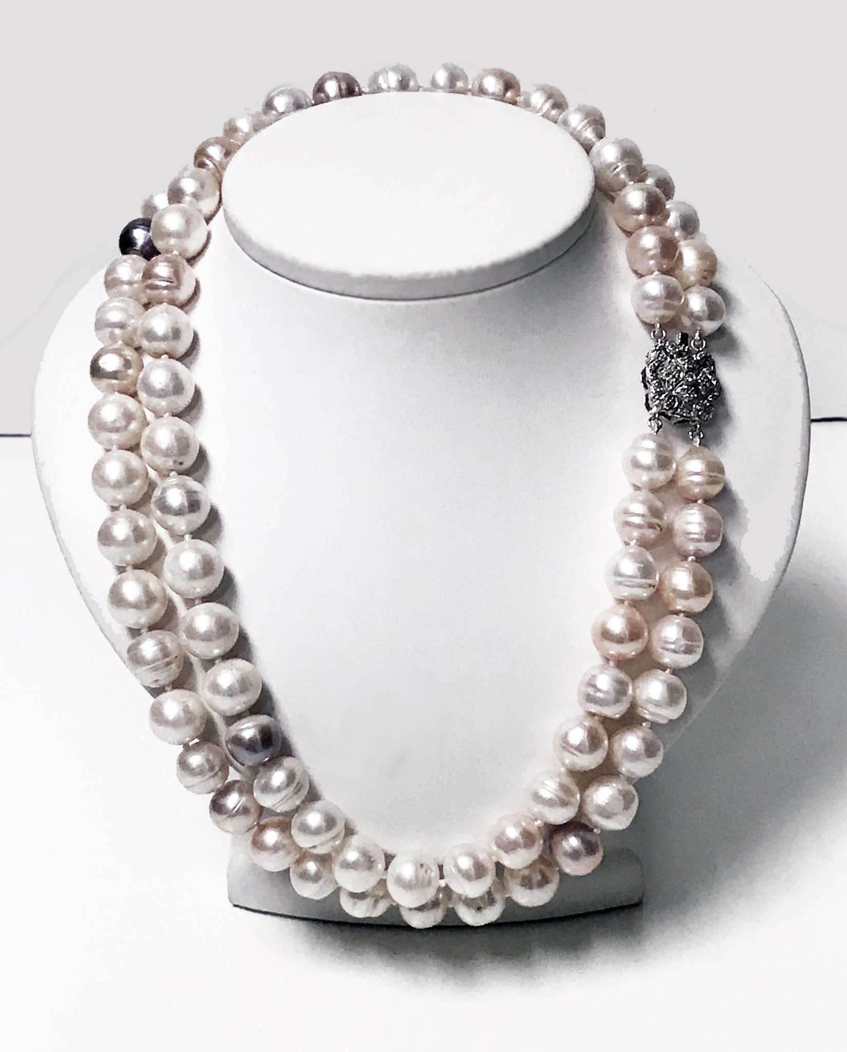 10.50 -11.50 mm Freshwater Cultured Pearl double Necklace, 14K white gold Diamond clasp. Two 18 inch strands (36 inch total), off round mixed colour, mainly white inter spaced with some lavender and pink, blemishes, medium-high lustre, seventy eight
