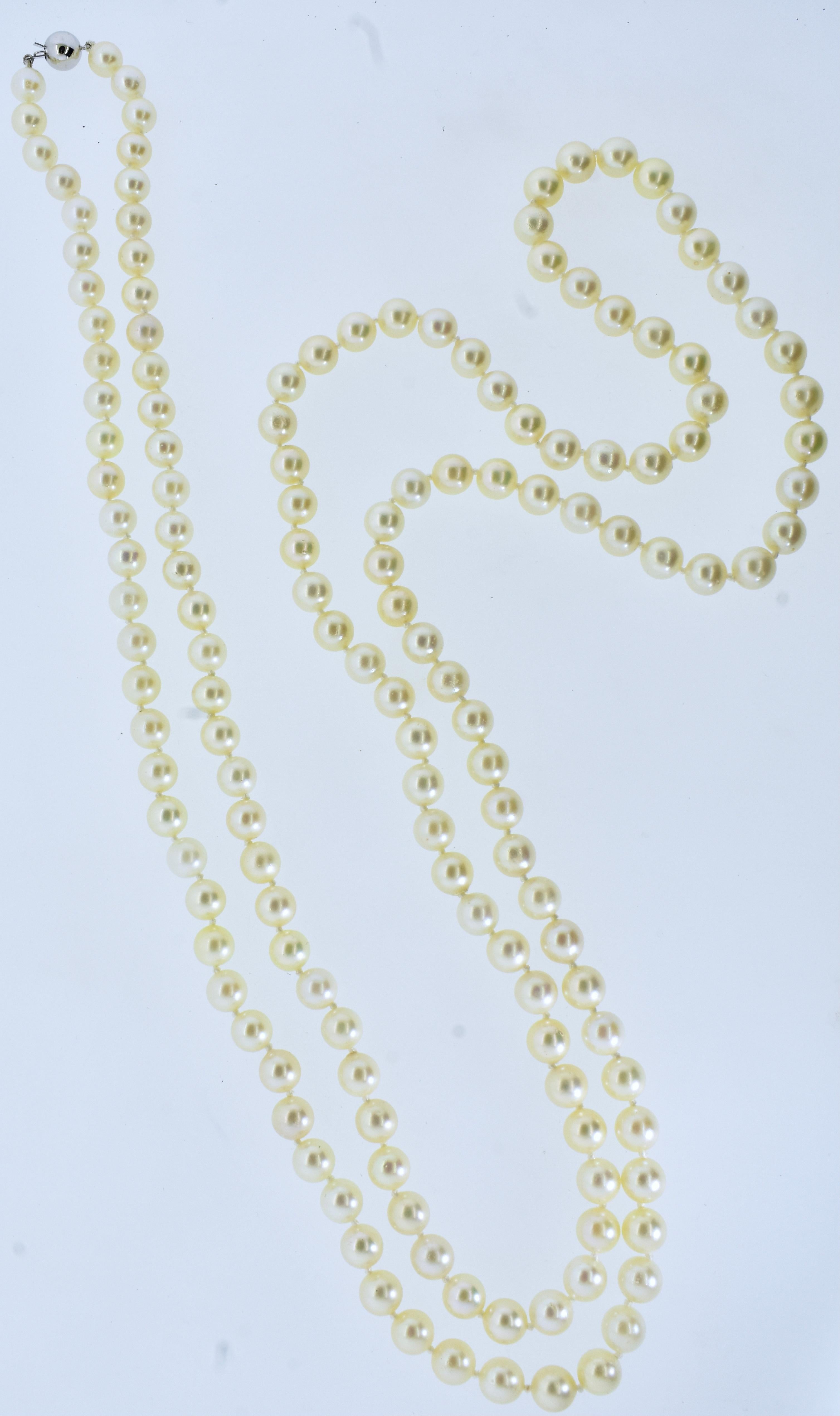 Cultured pearl double strand with a very long length of 52.5 inches.  There are 152 well matched round akoya (Japanese) pearls with a fine luster.  The pearl range in size from 7.5 to 8.0 mm.
All items sold are accompanied by a detailed appraisal by