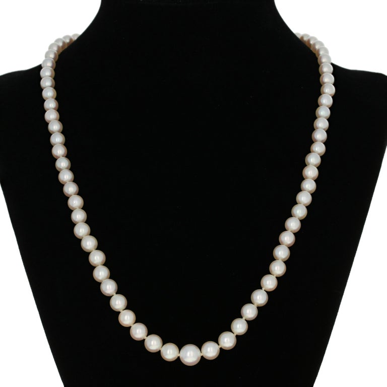 Metal Content: Guaranteed 14k Gold as stamped

Stone Information:
Cultured Pearls

Necklace Style: Knotted Strand
Measurements: length 19