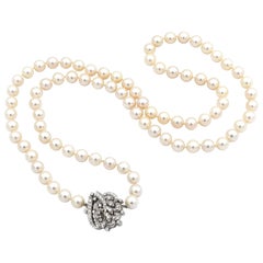 Retro Cultured Pearl Necklace with 2 Carat Diamond Set 14 Karat White Gold Clasp
