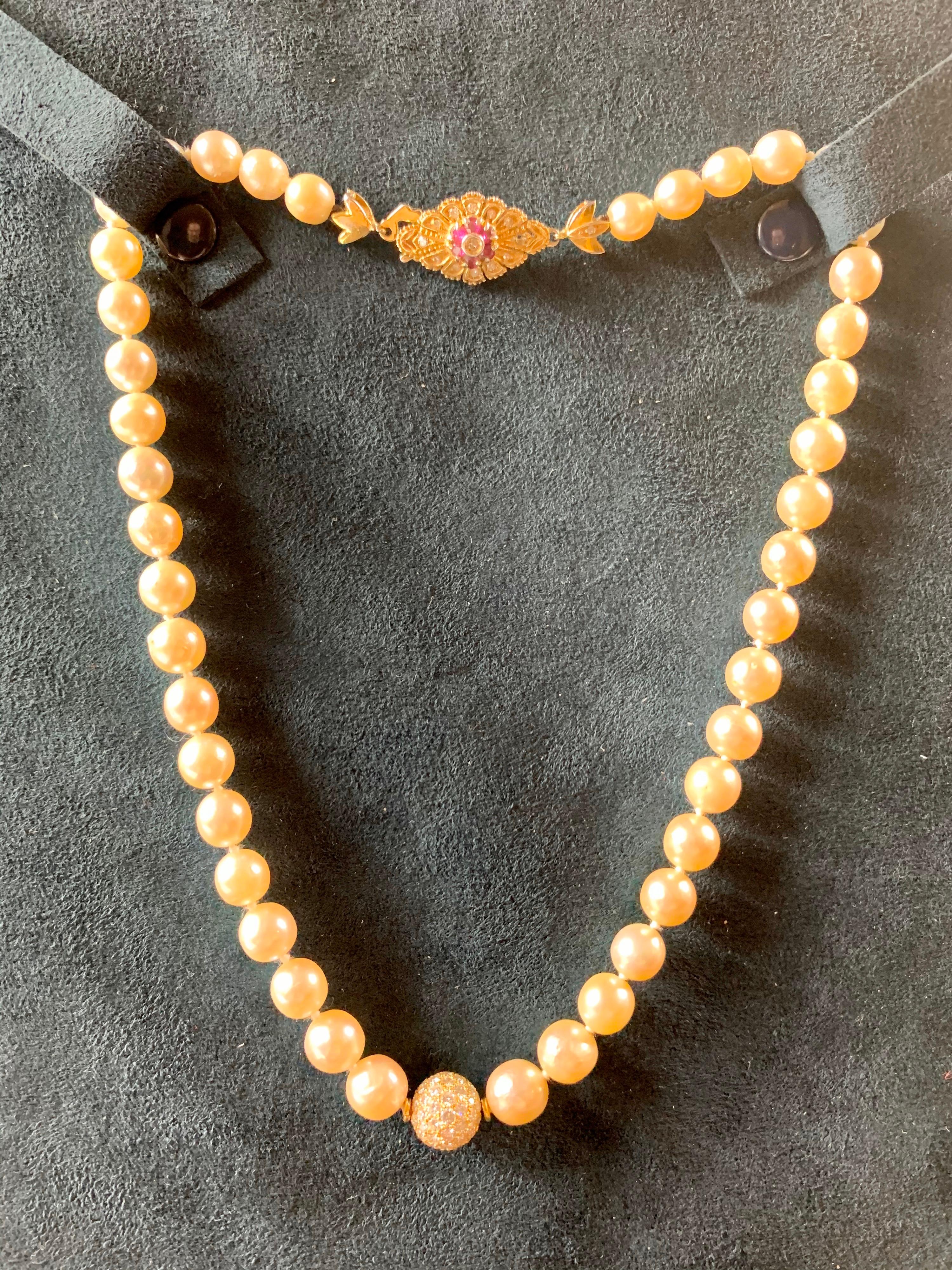 A Natural Vintage Cultured Pearl (8mm) Necklace With 1 Carat Diamond Pave Ball And 18 Carat Gold With Diamond And Ruby Clasp
