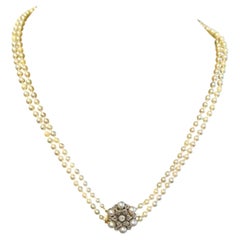 Cultured Pearl Necklace with Silver, Gold and Diamond Flower Clasp