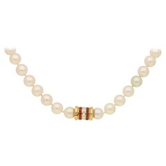 Cultured Pearl Row with Diamond and Ruby Clasp