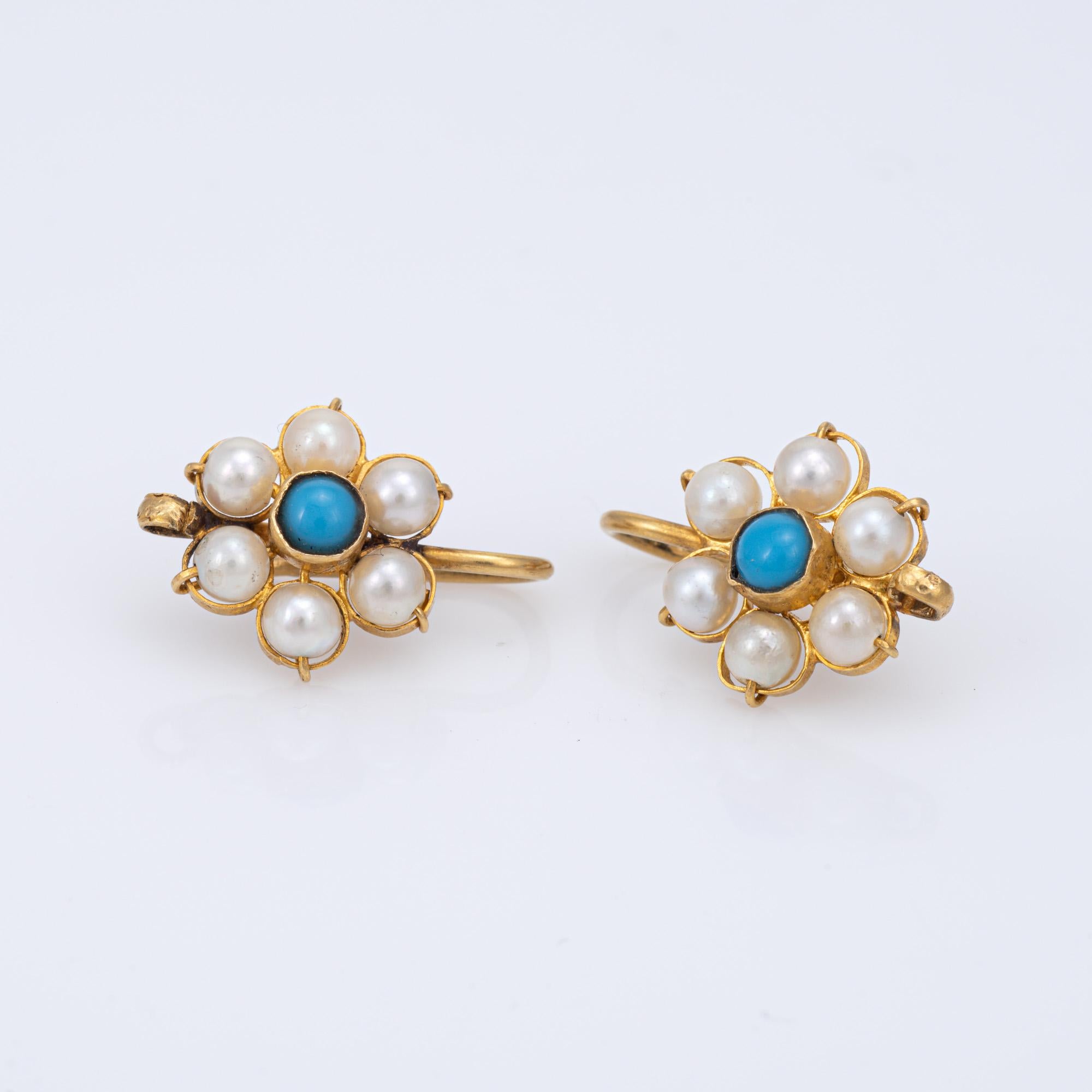 Finely detailed pair of vintage cultured pearl & turquoise flower earrings crafted in 18k yellow gold. 

Cultured pearls each measure 4mm each. Turquoise measures 3.5mm. 
The sweet earrings are crafted in the form of daisy flowers with creamy