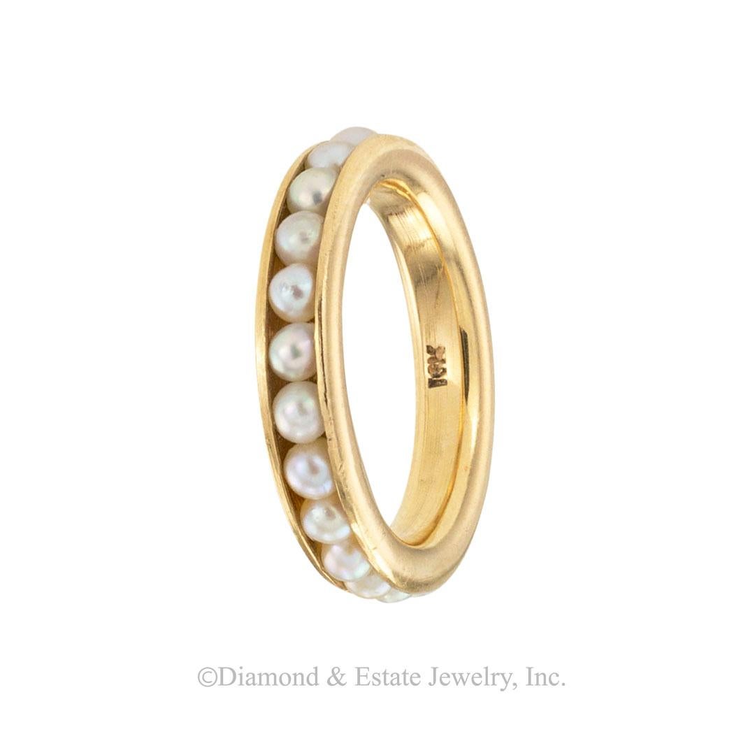 Cultured pearl and yellow gold eternity ring circa 1960.  We are here to connect you with beautiful and affordable antique and estate jewelry.

The facts you want to know are listed below.  Read on.  It is remarkably short, simple, and clear.  Do