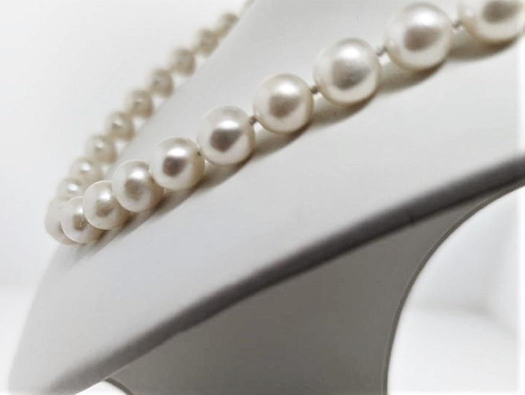 The necklace of straight 9mm CHINESE fresh water pearls is remarkably beautiful.  Many people do not understand the difference between Chinese and Japanese cultured pearls, so this is the story.  Japanese cultured pearls, the ones that your