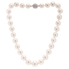 Cultured South Sea pearl necklace set with 18kt gold diamond ball clasp