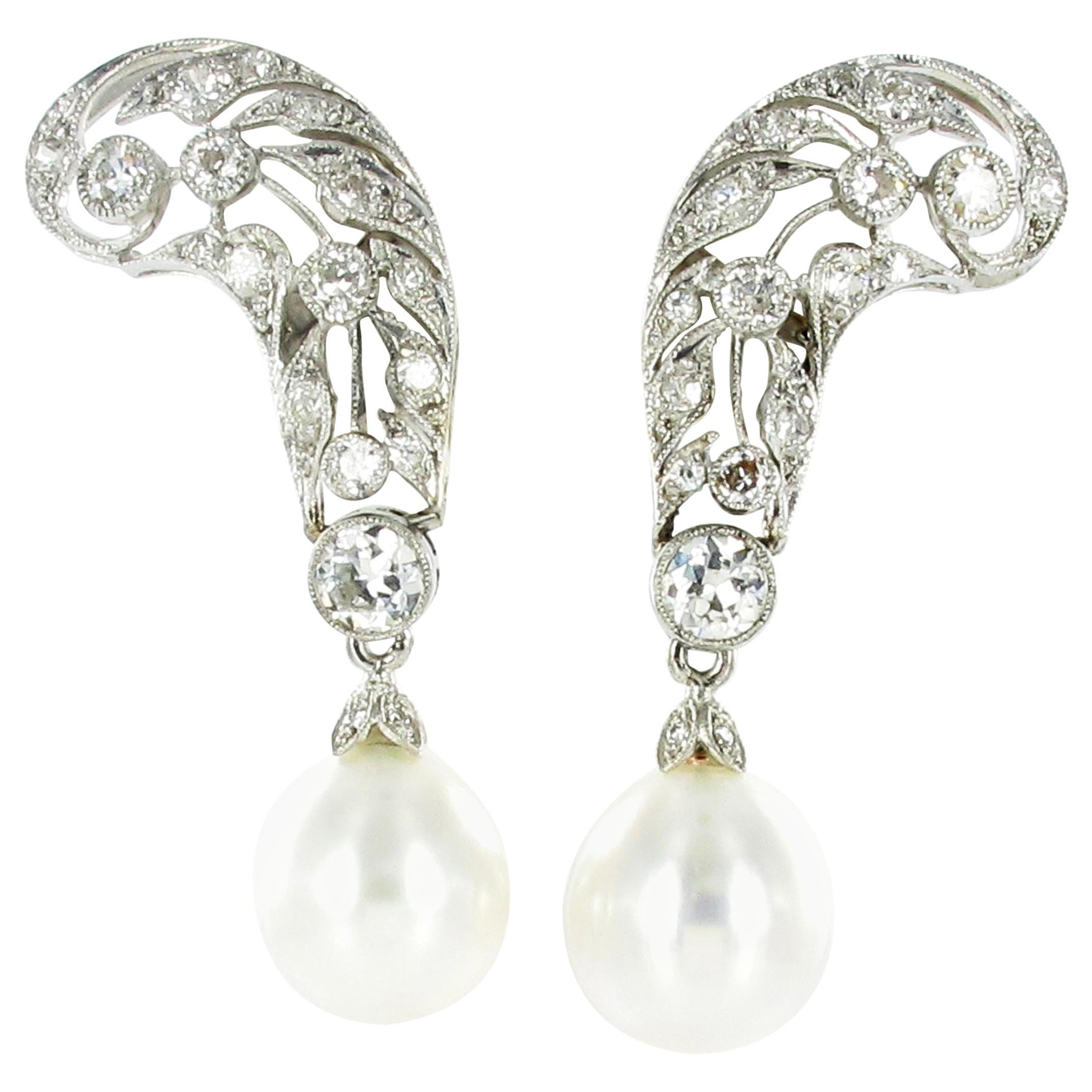 Boucles d'oreilles en platine avec perles de culture des mers du Sud et diamants