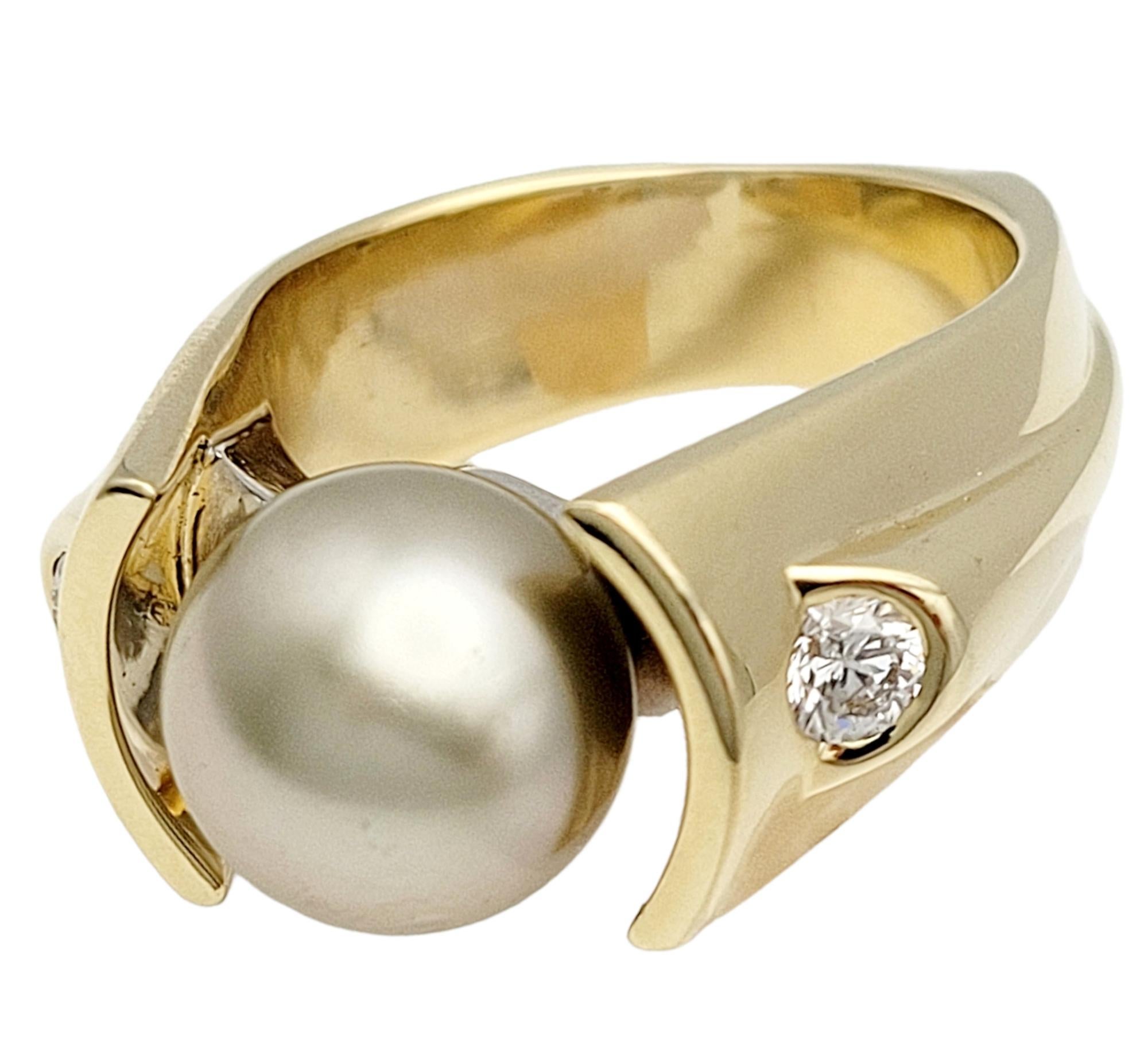 Ring size: 10

Introducing a stunning Cultured Tahitian Pearl & Diamond cocktail ring, a true embodiment of elegance and sophistication. Crafted in 14-karat yellow & white gold, this exquisite piece weighs 22.79 grams, ensuring a substantial and