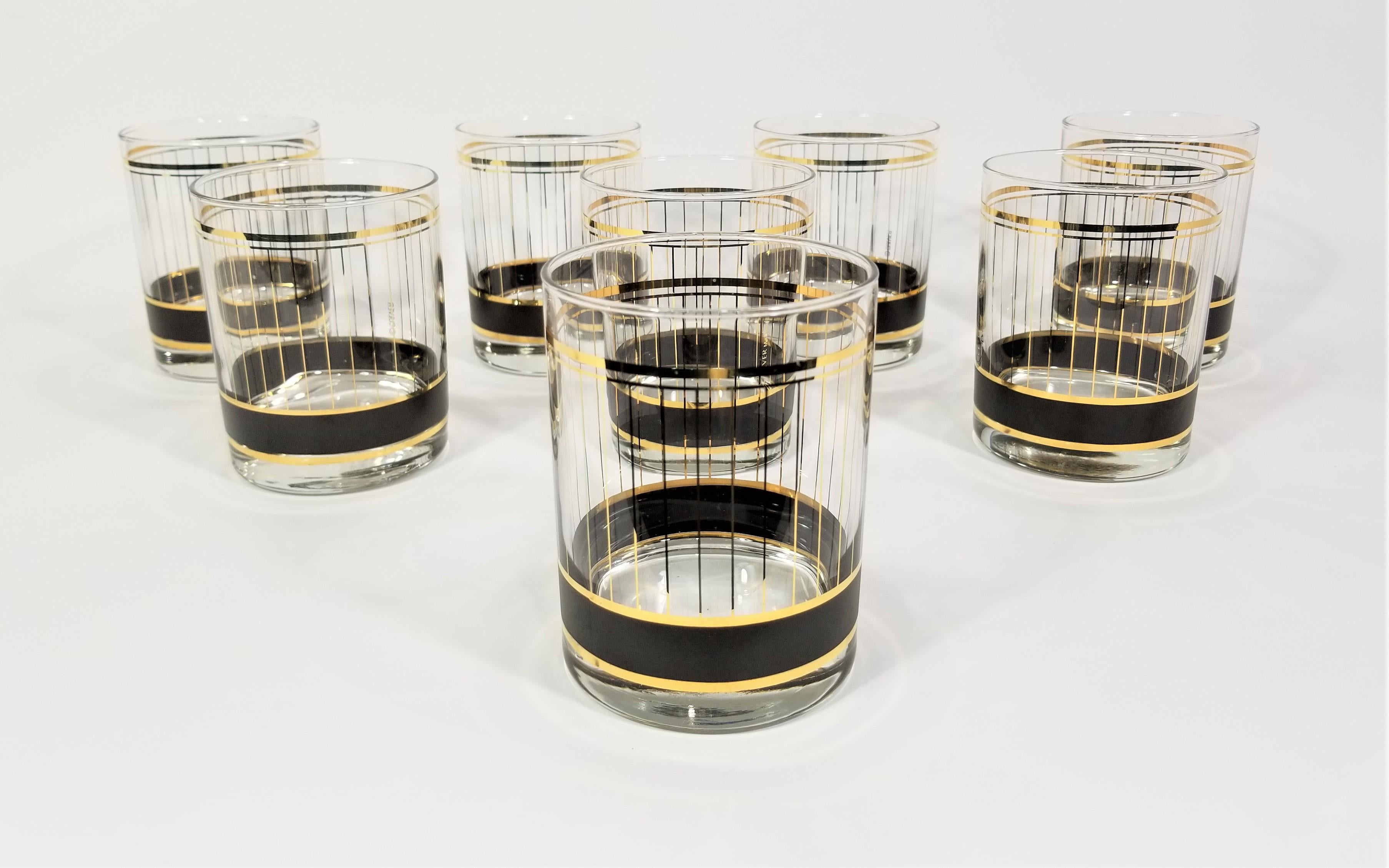 Mid-century 1970s Culver 22K gold double old fashioned or large rocks glasses. Gold stripe accents with black band. Set of 8. All glasses are marked Culver and in excellent condition.
