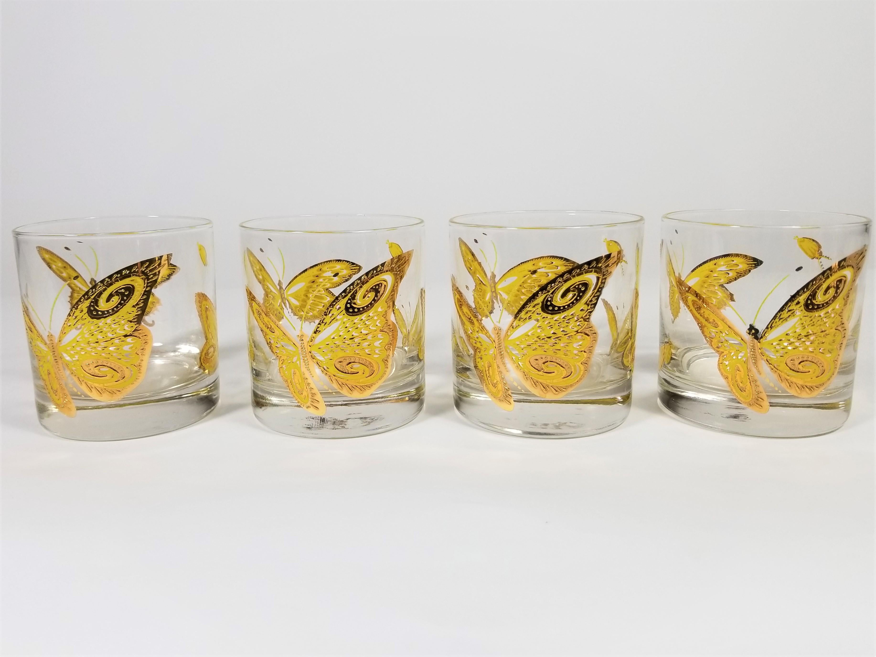 1960s Midcentury glasses with butterfly motif by Culver Inc. 22-karat gold textured design. Set of 4. All glasses are signed and I. Excellent condition.