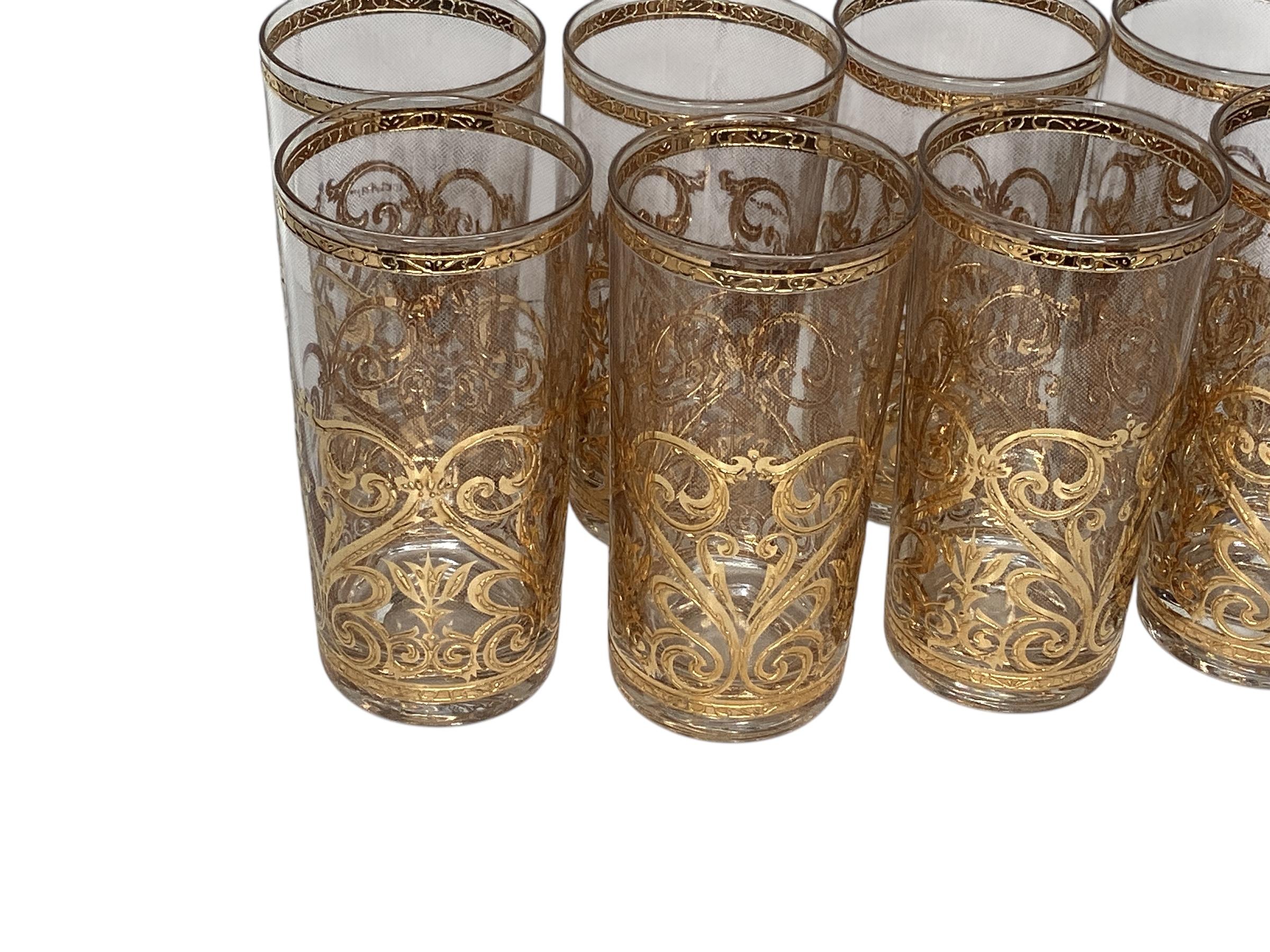 A set eight Culver highball water or cocktail glasses in the Spanish scroll pattern. Beautifuly decorated in 22k gold.