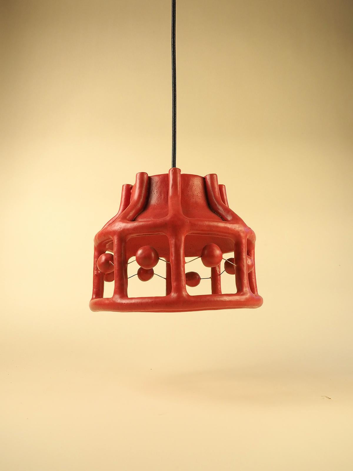 Ispirato alle radici culturali dei nonni materni dell'artista, questo pezzo fonde elementi di arte popolare messicana con una silhouette di ispirazione scandinava.  Il nome Cuna deriva dalla parola spagnola che significa culla. Il design misto culla