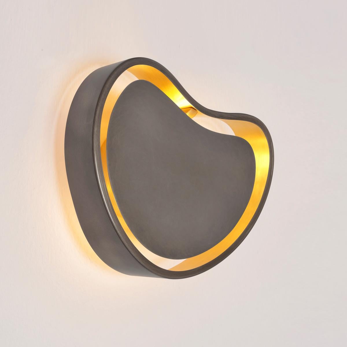 The Cuore collection was conceived with the goal of creating fixtures that are unexpected yet clean and harmoniously balanced. This is highlighted by the organically styled shades with multiple diffuser options: They can be brass with a backlit open