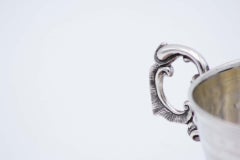 Cup and saucer in guilloche silver with pearlescent reliefs and monogram plaque