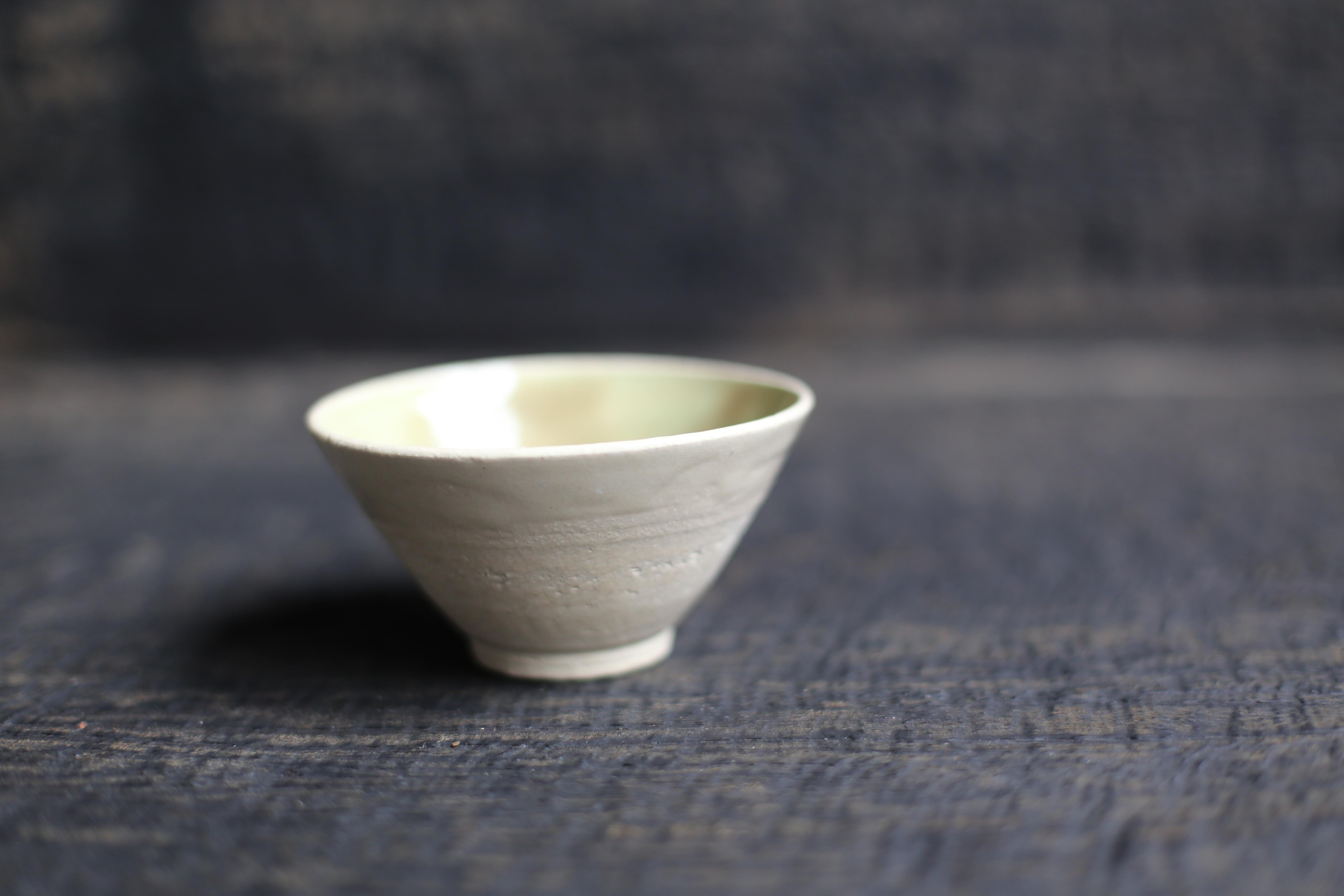Cup in white clay with pastel green + sheer glaze
2022s / Belgium
Size : f110 h60 mm
Artist : Sigrid Volders


[Sigrid Volders]
Based in Antwerp, Belgium, she works vigorously as a ceramic artist, mainly as a hair-making artist active in