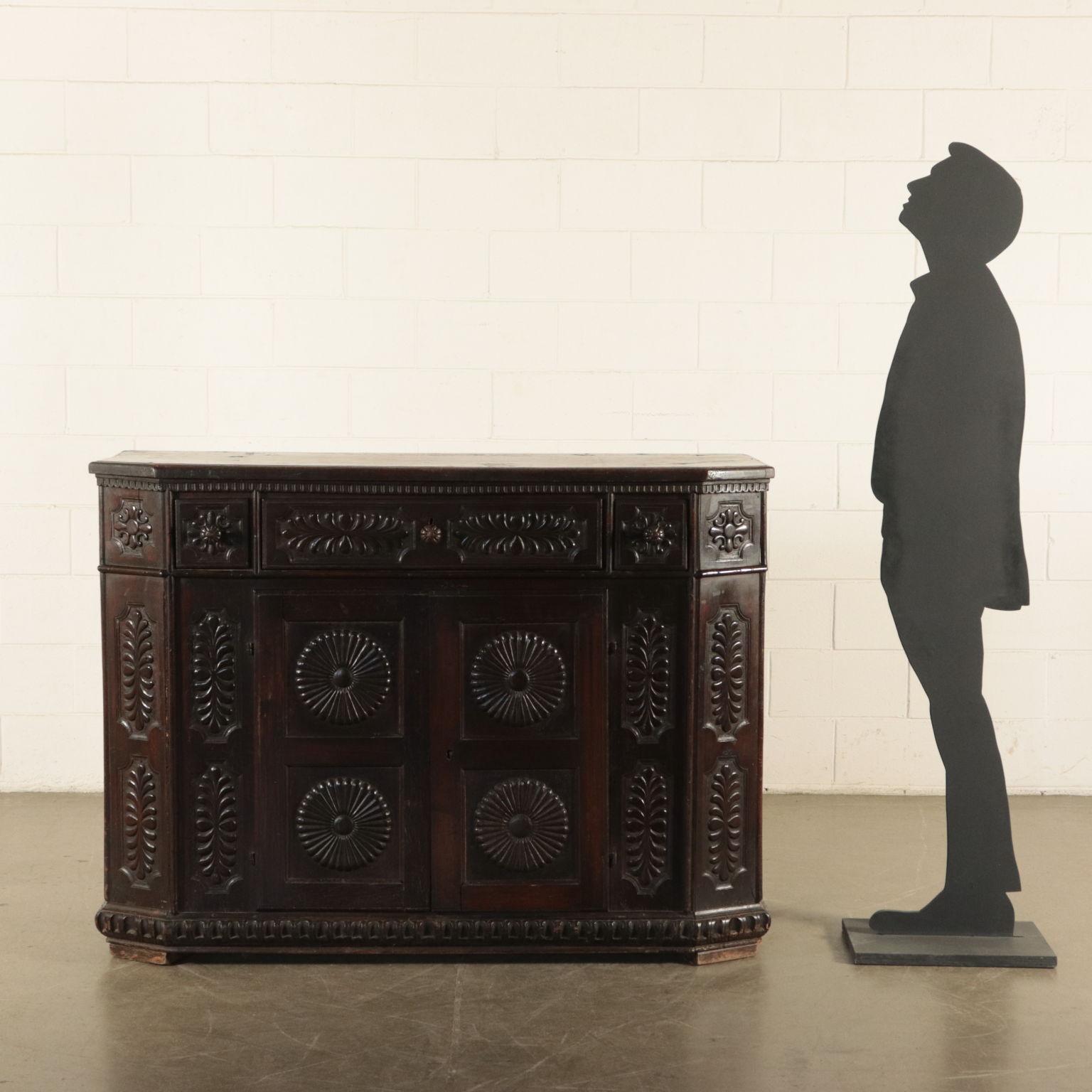 Cupboard built with ancient parts and reassembled at the beginning of 20th century. Original baroque style flowery and leafy carvings; tope made reusing the one of an old ottoman.