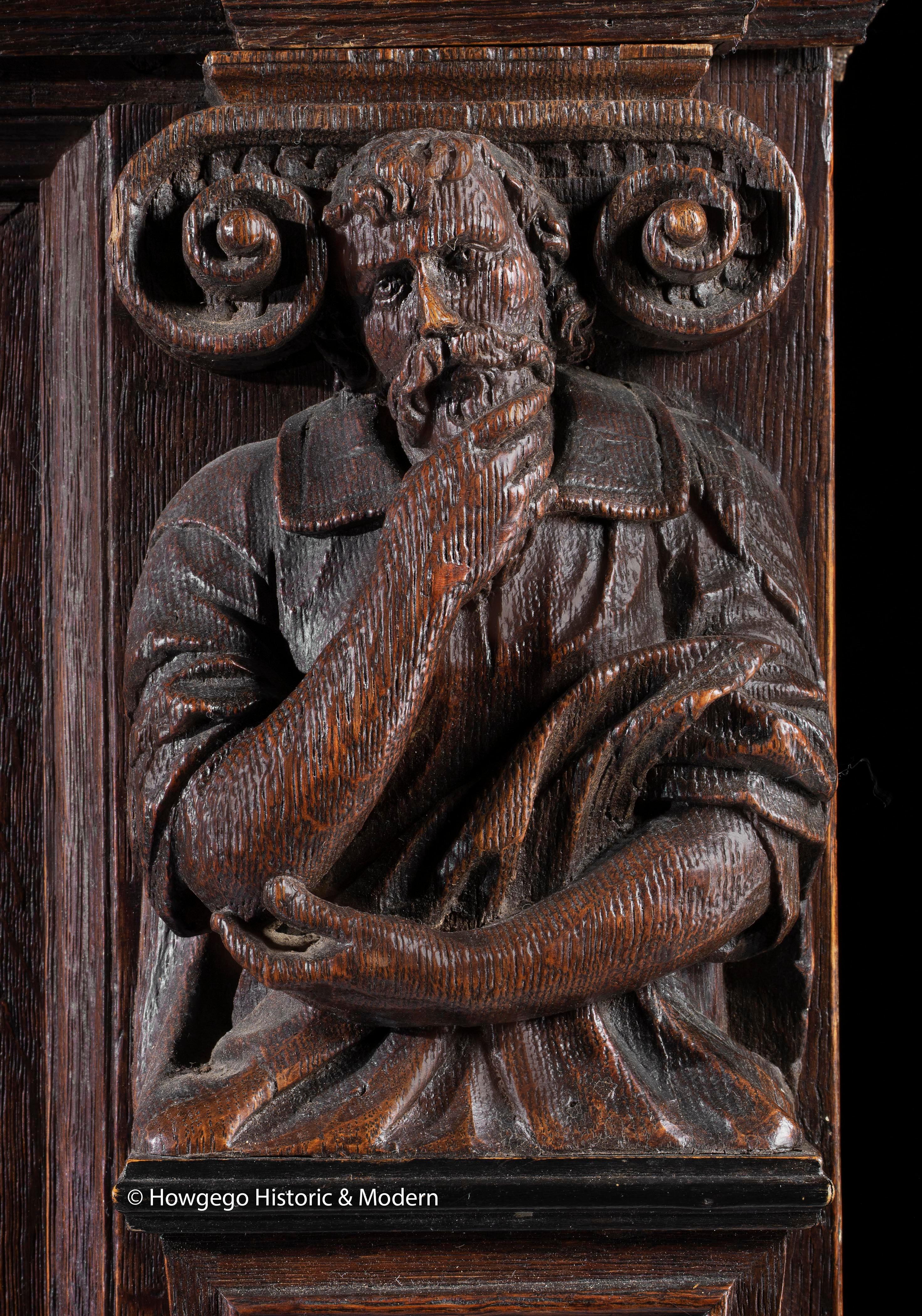 An exceptional, large, early-17th century, carved, oak & ebony, Flemish, statue cabinet or 'Beeldenkast' depicting the three theological virtues of Faith, Hope and Charity and the Cardinal Virtues of Prudence, Justice and Fortitude.

just purchased