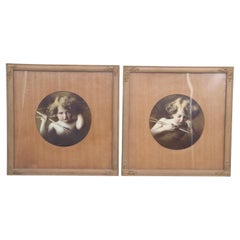 Antique Cupid Awake and Cupid Asleep framed photographs