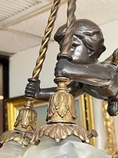 Cupid Cherub Form Gilt and Patinated Bronze Chandelier