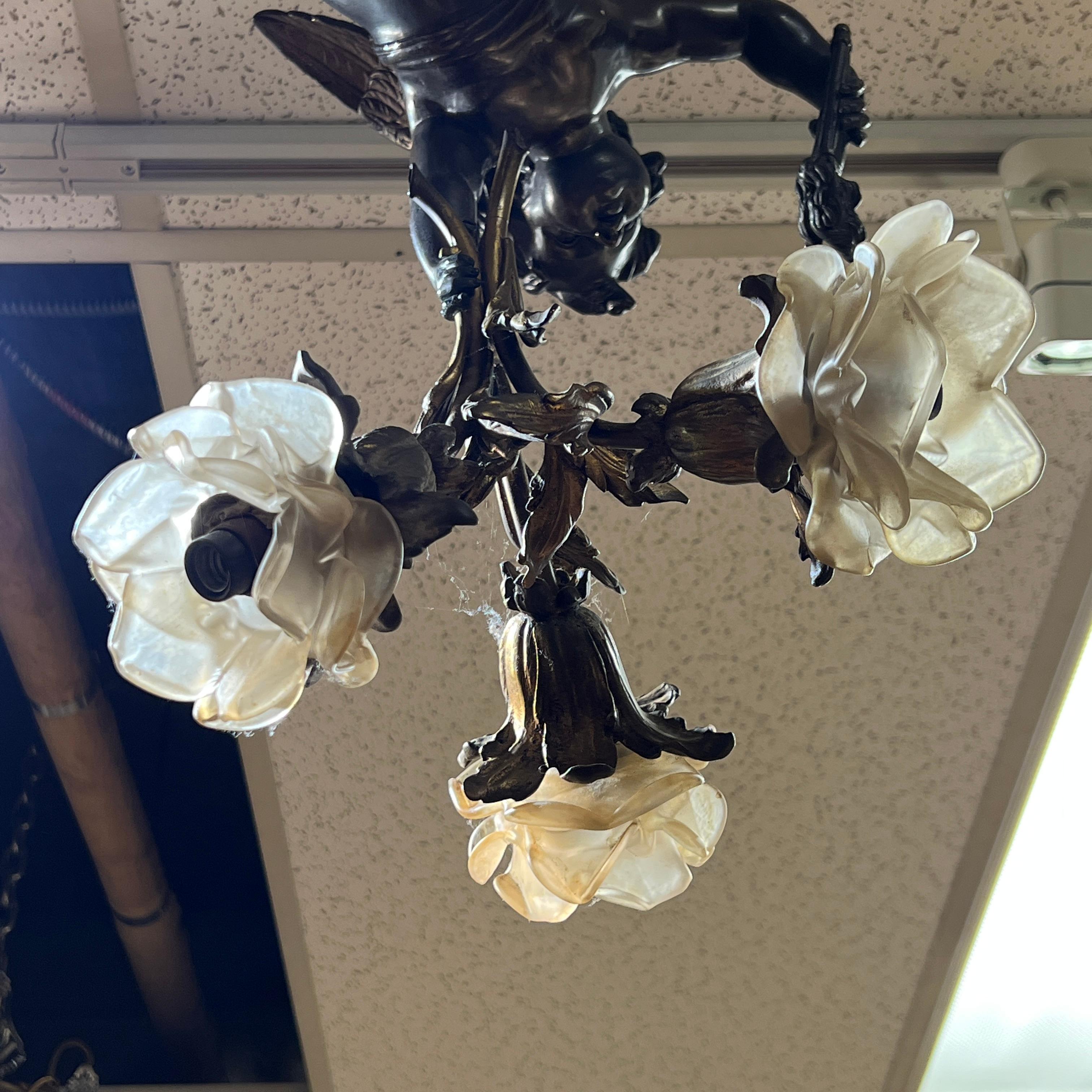 Patinated Cupid Cherub Form Three-Light Bronze Chandelier