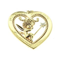 “Cupid in a Heart” Heart Shaped Diamond in Yellow Gold Pendant