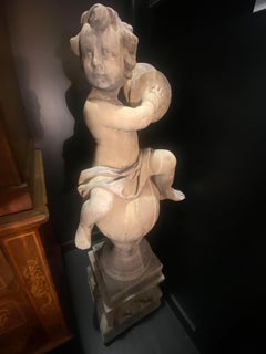 Cupid Statue on Pedestal