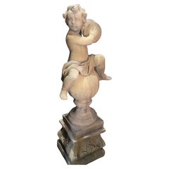 Antique Cupid Statue on Pedestal