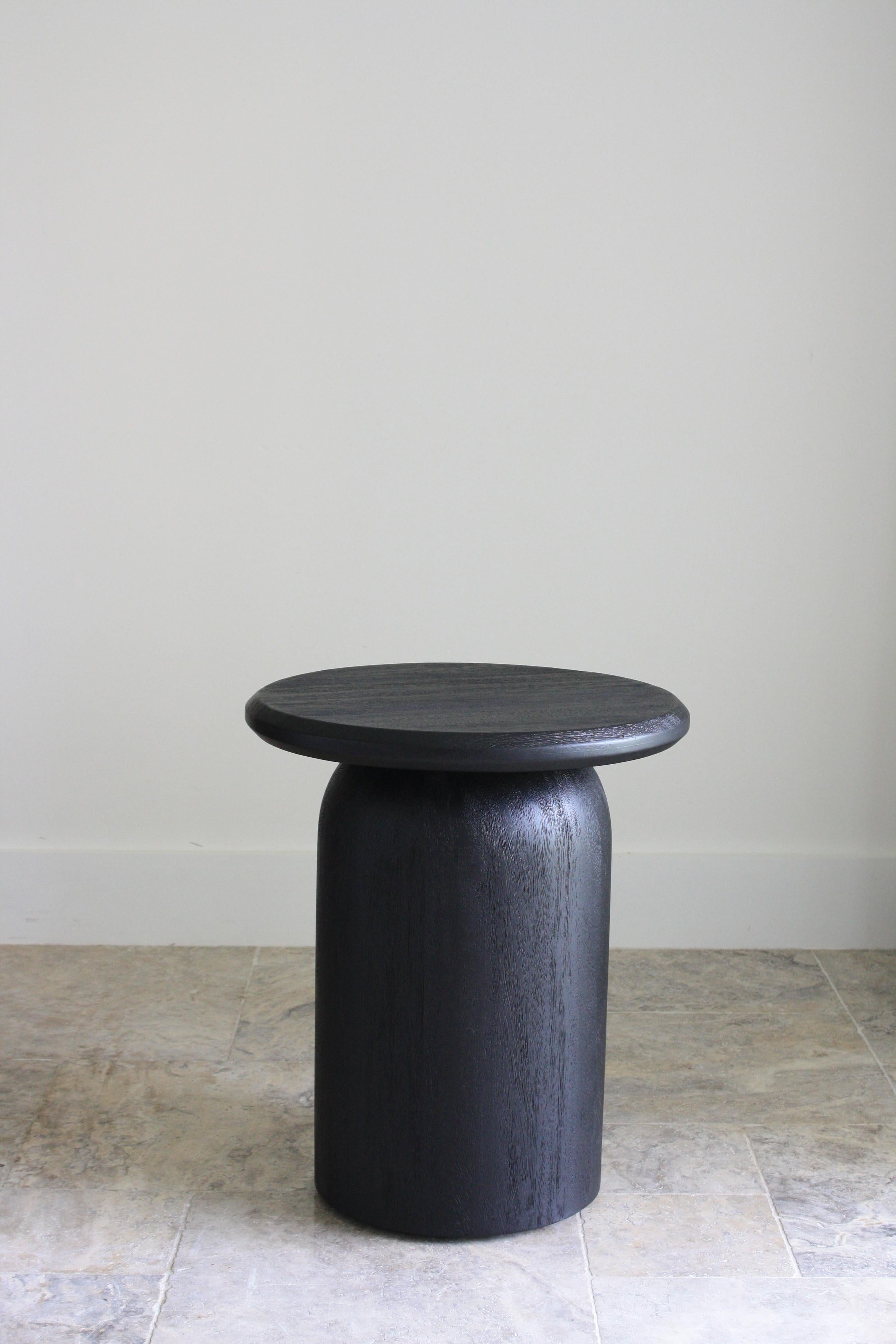 Black stained Conacaste wood hollow center for weight in base and solid wood top.

Part of Labrica's Arco collection was inspired by Spanish Colonial Architecture found in Antigua Guatemala.

We played with architectural elements such as arches and